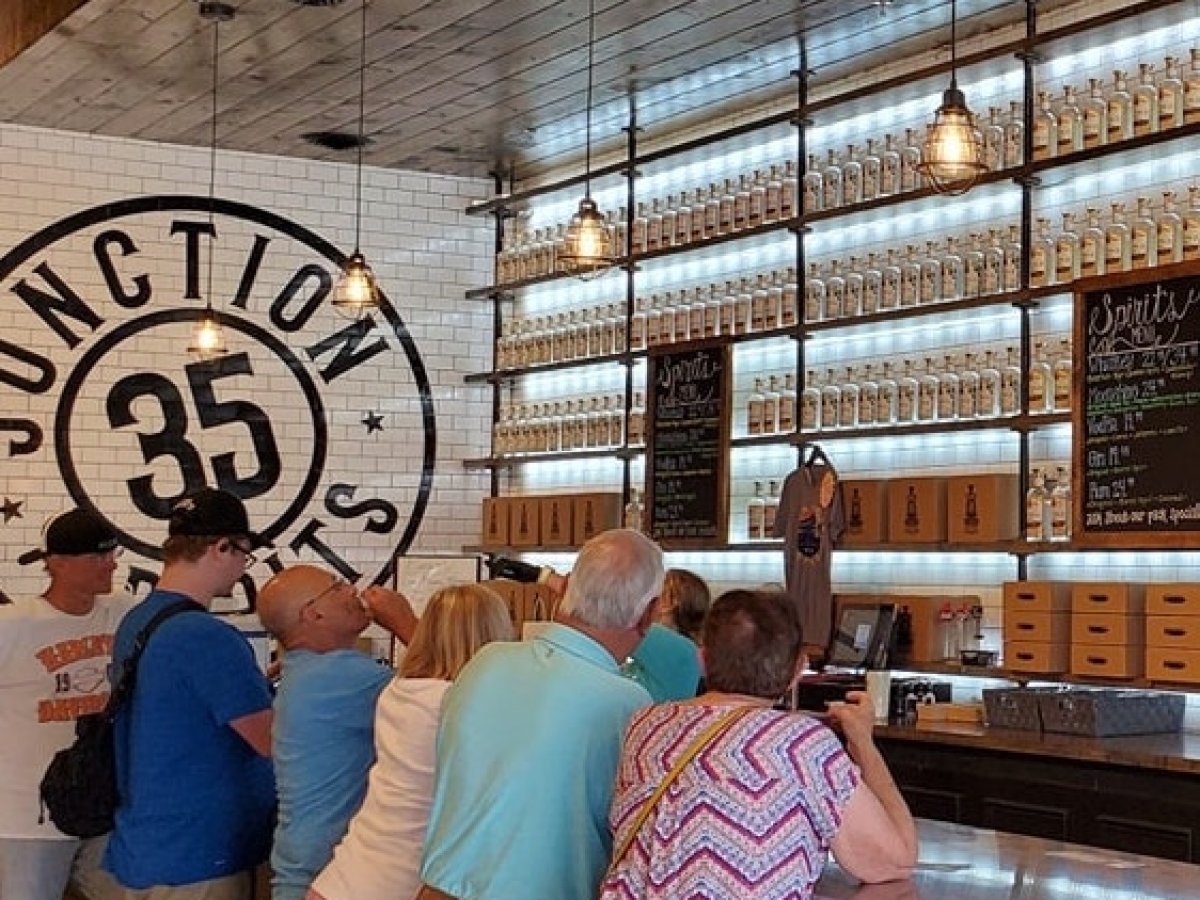 a group of people standing in a room