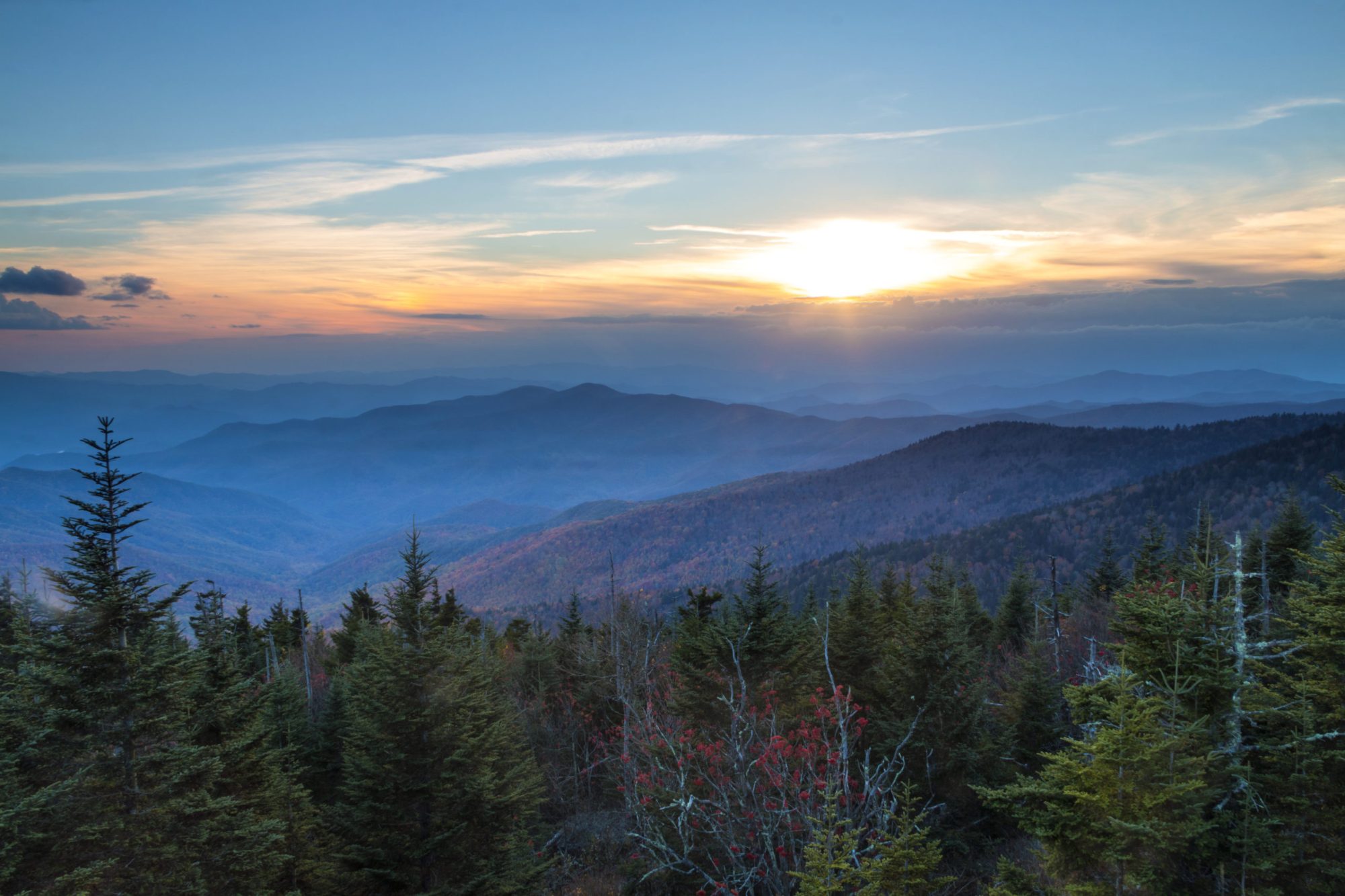 dramatic autumn sunset overlooking the Appalachian mountains viewed from Clingmans Dome in the Great Smoky Mountain National Park in Tennessee. dramatic autumn sunset overlooking the Appalachian mountains viewed from Clingmans Dome in the Great Smoky Mountain National Park in Tennessee.